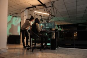 Cyber security specialists fixing computer system cyberattack Αρχική - Cyber News